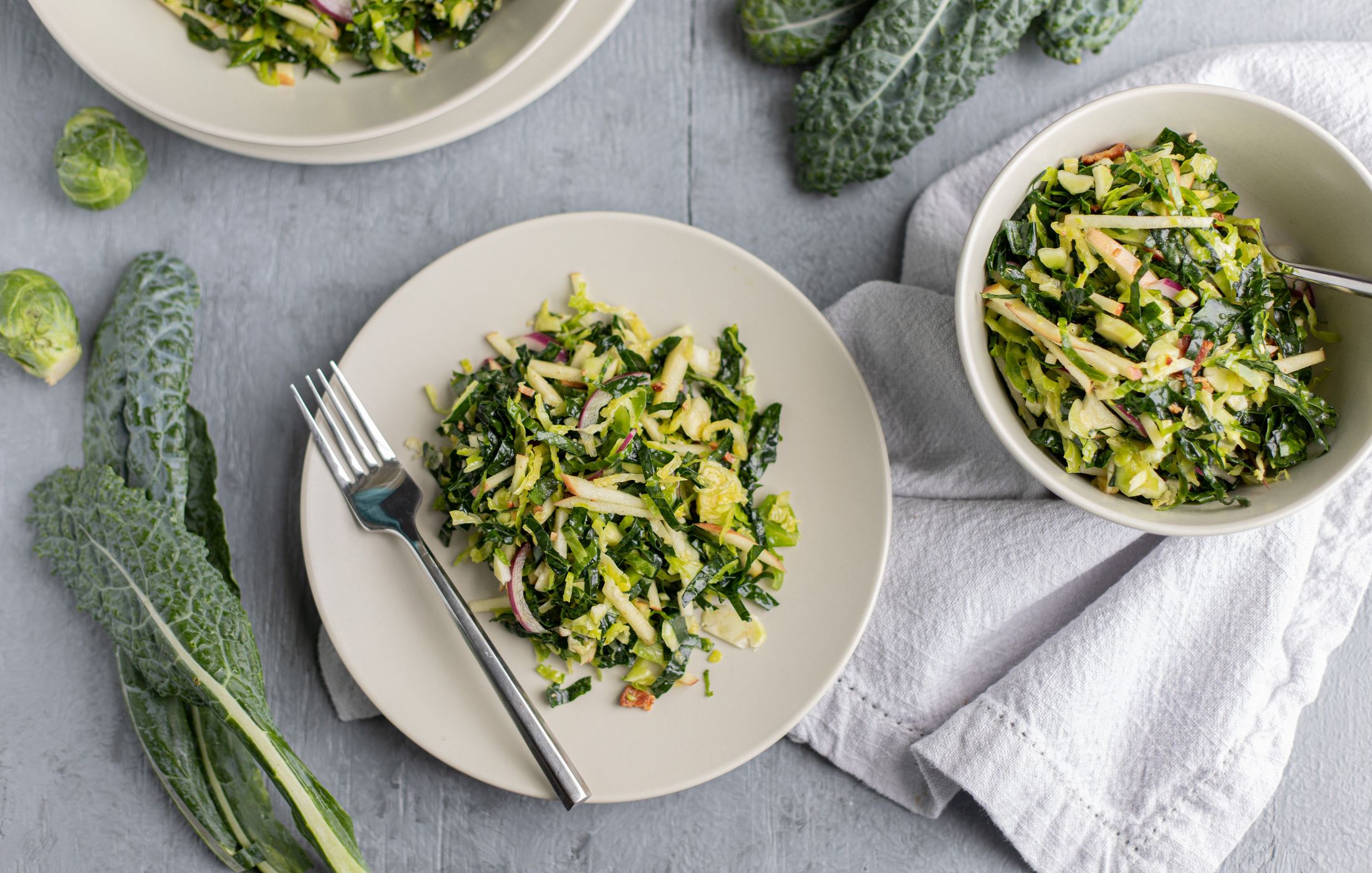 Kale and Brussels Sprout Salad with Bacon and Apples Nourishing Meals®